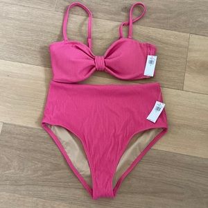 Pink ribbed bandeau bikini top and high-waisted bottoms